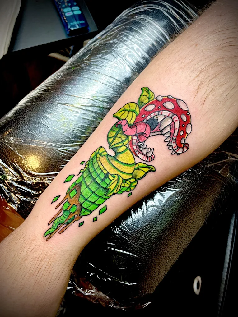 Omen Ink Tattoos and Piercings